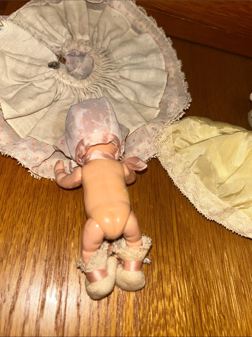 Pair of Vintage Baby Dolls with blinking eyes - Pink and Pale Yellow dresses